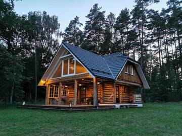 Фото Дома для отпуска "Gaujmale" sauna house in nature г. Iļķene 1